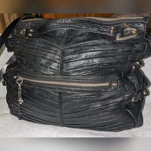 Junior Drake black Italian leather pleated shoulder bag.